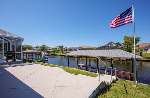 Palm Harbor House | Canal-Front House With Covered Deck, Pool, Dock + Prime Location