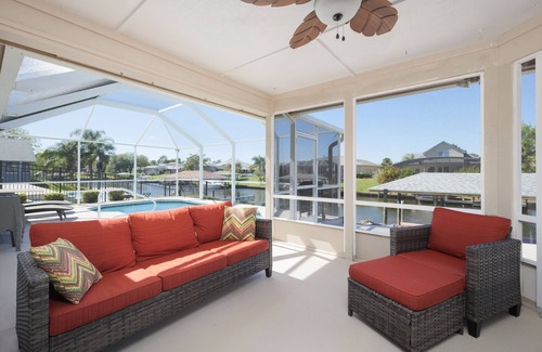 Palm Harbor House | Canal-Front House With Covered Deck, Pool, Dock + Prime Location