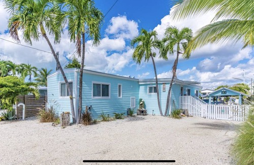 Key Largo Village House | Canal Front with Bay Access Home and private sandy beach.