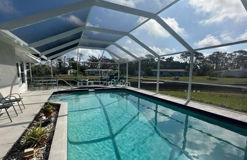 Englewood South House | Canal Home to Gulf Completely Renovated, Large Pool, come to Serenity Retreat!
