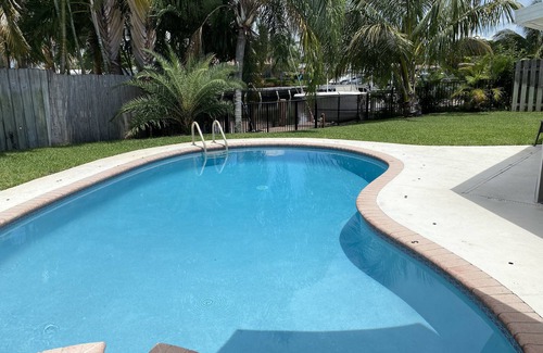 Garden Isles House | Canal home with pool and great sunset view!