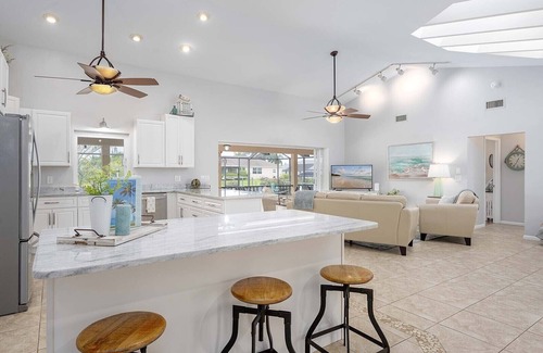 Cape Coral House | Canalfront/Outdoor Kitchen/Pool/Spa/Boat Dock