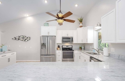 Cape Coral House | Canalfront/Outdoor Kitchen/Pool/Spa/Boat Dock