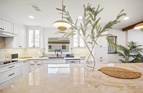 Palm Harbor House | Canalfront w/Pool, Kayaks, Bikes & Boat Access