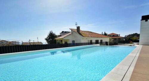 Portonovo Apartment | CANELAS SUITES PREMIUM NUEVOS con PISCINA, AMPLIAS TERRAZAS Y GARAJE