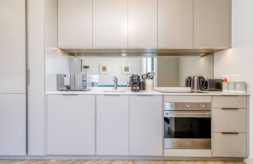 Greater Johannesburg Metropolitan Area Apartment | Canvas of Comfort Beneath Rosebank Skies