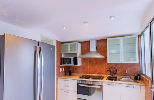 El Yaqui Condo | Capitalia - Spacious-Clean-Modern