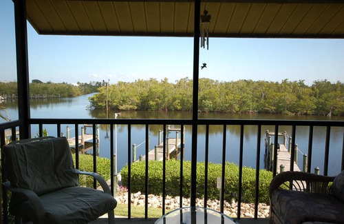 Bokeelia House | Captain's Harbor Condo Relax: on your private screened balcony and enjoy the scenery just outside this gorgeous condo.