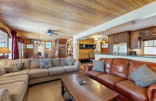 Meredith House | Captivating lakefront home with private dock, row boat, firepit, and lake views