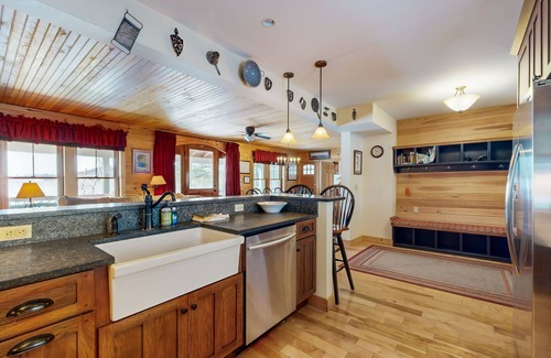 Meredith House | Captivating lakefront home with private dock, row boat, firepit, and lake views