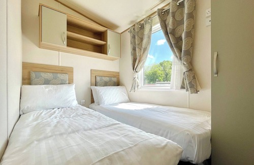 Alford House | Caravan with one double and one twin.