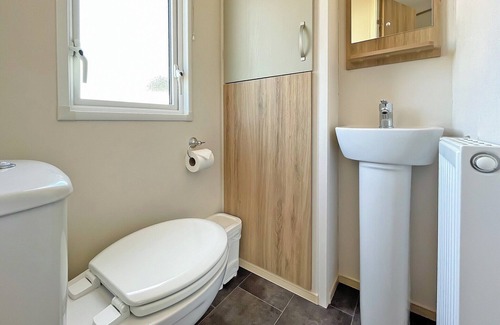 Alford House | Caravan with one double and one twin.