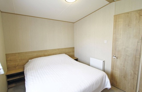 Alford House | Caravan with one double and two twin.