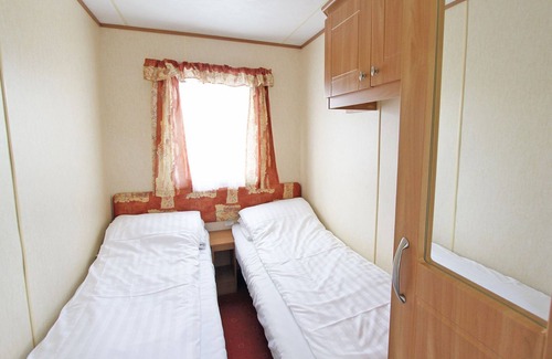 Alford House | Caravan with one double and one twin.