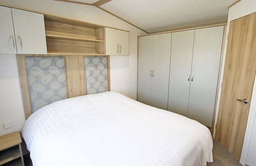 Alford House | Caravan with one double and two twin.