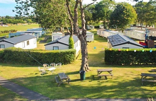 Sandown House | Caravan with one double and one twin.