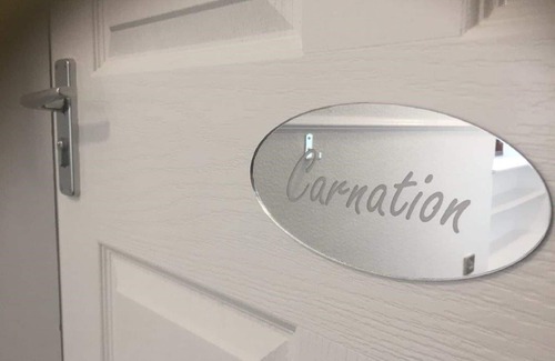 Banff House | "Carnation" is a double bedroom with en-suite within Josie's House in Banff