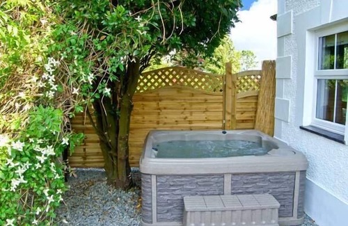 Bodorgan Cottage | CARREG RHYS, pet friendly, with hot tub in Malltraeth