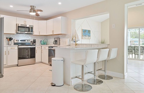 Estero Bay Shores House | Casa Bonita, "Sun & Fun"-On Canal with Pool