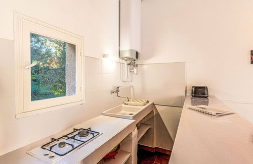 Santa Giulia House | Casa Cala Rossa by Interhome