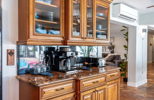Cocoa Isles House | Casa De Olas Waterfront Luxe Home Heated Pool Boat Lift Minutes to Beach
