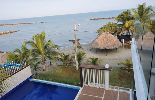 Sucre House | Casa frente al mar con piscina, terraza, aire acondicionado, totalmente dotada.