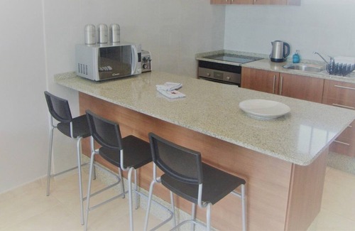 Puerto del Carmen Apartment | Casa Kazz, lovely 1 bed central PDC apartment with sea & pool views