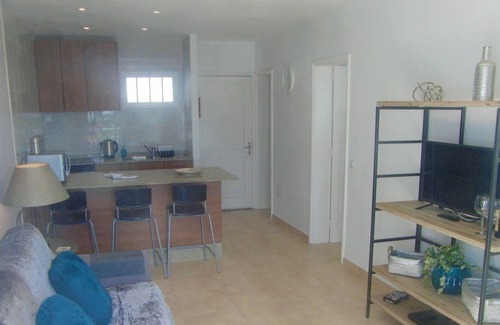 Puerto del Carmen Apartment | Casa Kazz, lovely 1 bed central PDC apartment with sea & pool views