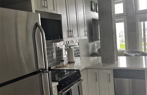 Charlevoix Condo | Casa Lake Life on Beautiful Lake Charlevoix in Foster Boat Works