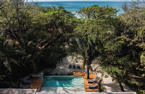 Playa Santa Teresa Villa | Casa Lanui, large beachfront luxury villa by Elite Beach Villas
