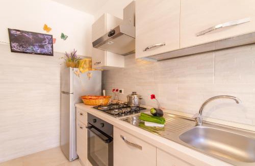 Sant'Isidoro Apartment | Casa Lory 3 Cozy And Near The Sea - Happy Rentals