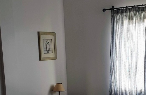 Vila Franca do Campo Cabin | Casa Marina-Sunrise Room: Double bed room with swimming pool and parking.
