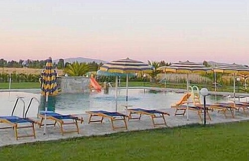 Grosseto House | Casa Marieva E: A welcoming apartment surrounded by the greenery.