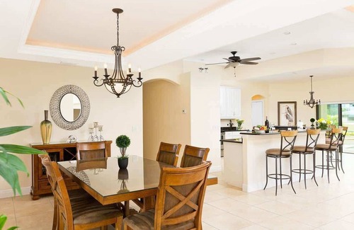 Cape Coral Villa | Casa Nueva Waterfront w/Heated Pool/Spa + Tiki