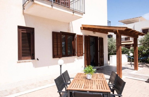 San Vito Lo Capo Apartment | Casa Orchidea Bianca with large equipped veranda