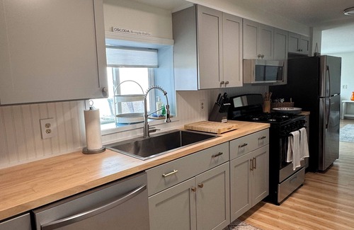 Oscoda House | Casa Playa - Lakefront Escape with Private Sugar Sand Beach, Game Room, Sleep 8