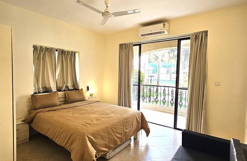 Assagao Bed & Breakfast | Casavilasa-2BHK Ground Floor park facing fully loaded Kitchen, AC, Balcony, WIFI
