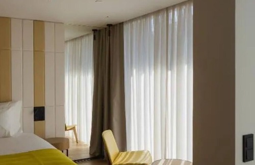 Sao Jorge de Arroios Hotel | Castle Glimpses, Magical Light Show & Pool Bliss—Your Lisbon Retreat Awaits