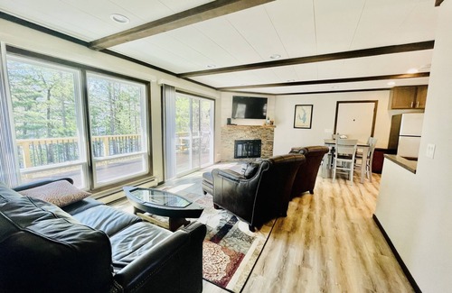 Lake Shore Estates House | Castle Rock Lakefront Home, with pier, sand bottom, and wrap around deck