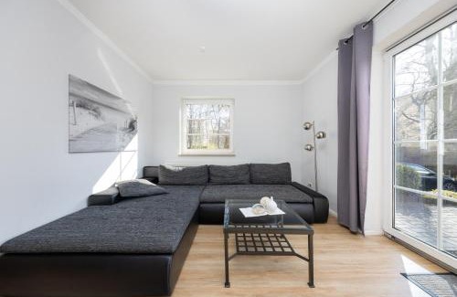 Hohe Dune Apartment | CBlue "Ferienhaus am Yachthafen - Moewe"