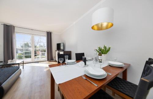 Hohe Dune Apartment | CBlue "Ferienhaus am Yachthafen - Moewe"