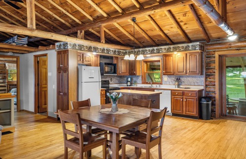Town of Milo House | Cedar Lane Cabin: Authentic log cabin in wooded setting overlooking rural farmland