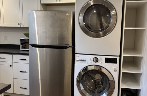 Bowmanville Apartment | Cedar Suite - Cozy fireplace, full kitchen & in-suite laundry