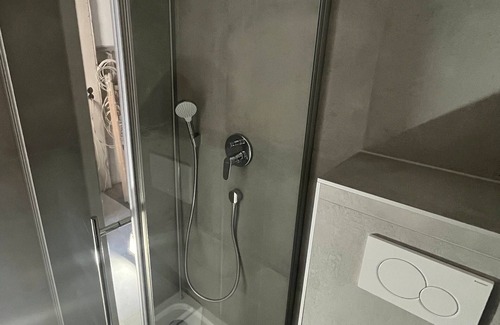 Seelberg Apartment | Central 1-room apartment kitchen, washing machine, parking space, flexible sleeping area