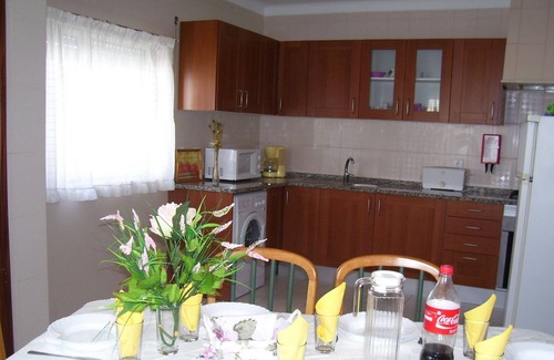 Areias de Sao Joao Apartment | Central apartment by the sea with pool and garden for 4 people.