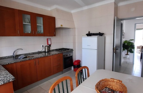 Areias de Sao Joao Apartment | Central apartment by the sea with pool and garden for 4 people.