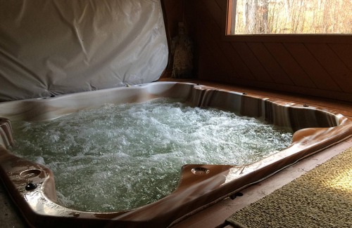 Killington Ski Chalet | Central Ski home with Hot Tub, sauna, walk to restaurants, and ski shops
