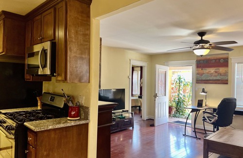 Mid City Cottage | Centrally located! 15 min. to beach, outdoor patio & pet friendly!