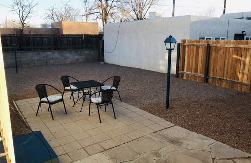 Southeast Heights House | Centrally located and huge private enclosed backyard