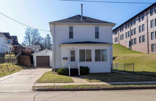 Dubuque House | Centrally located in family friendly neighborhood with off street parking.